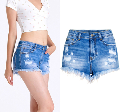 Summer ripped irregular cat whiskers with fringed, high-waisted jean shorts